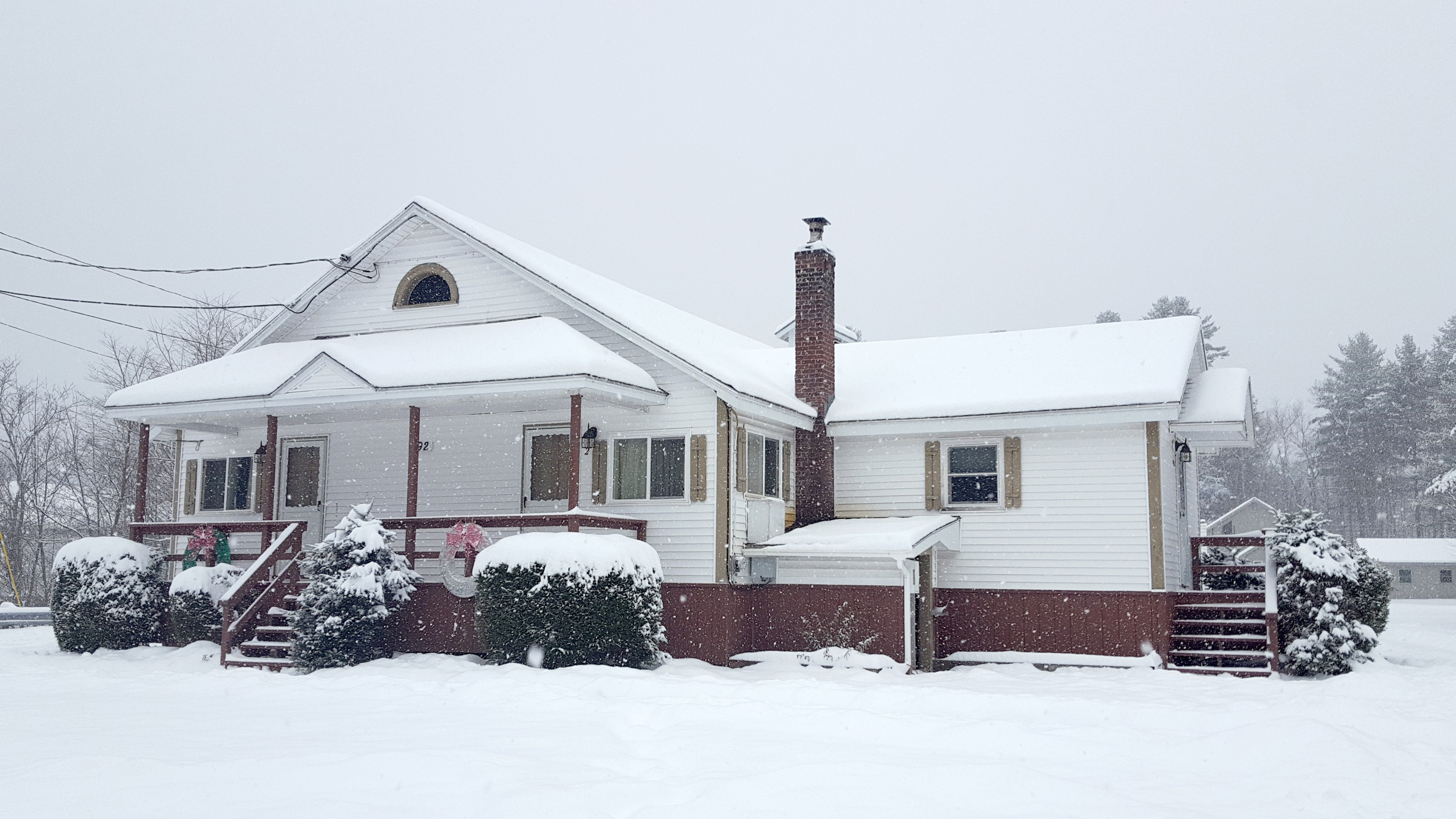 Riverbank Main building in snow.